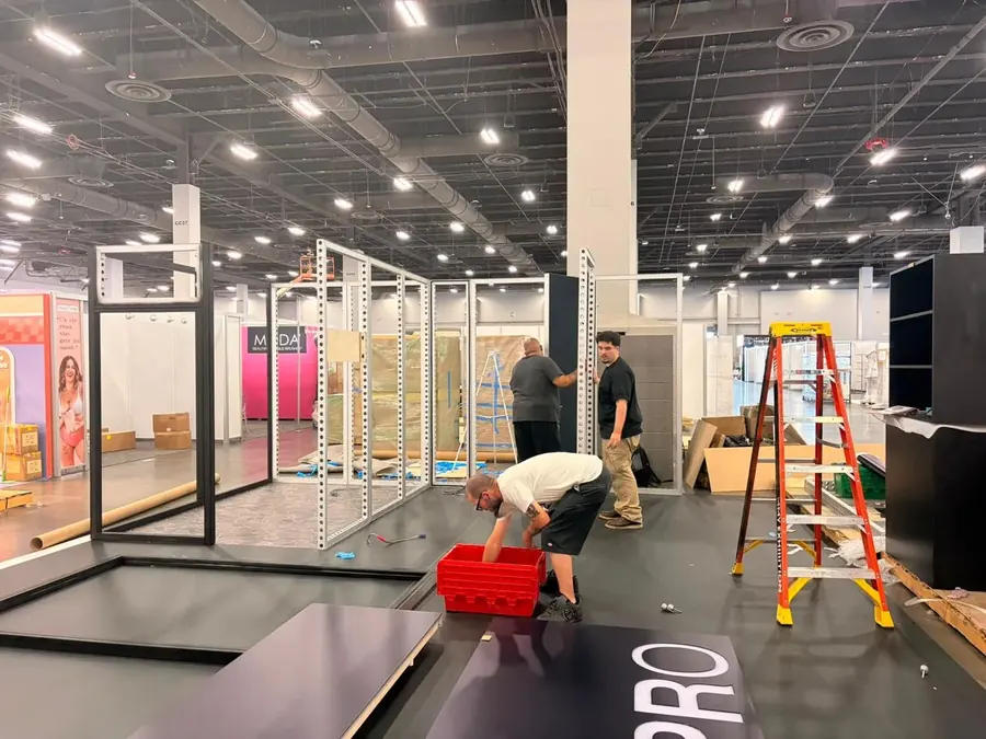 Installation team assembling display frames