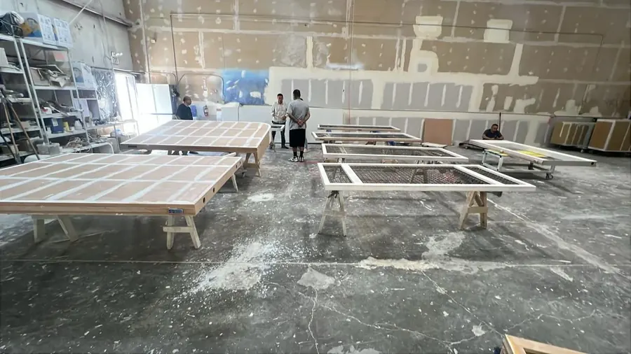 Timber frames being assembled in a workshop